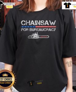 Top chainsaw graphic on a 'Department of Government Efficiency' ladies tee, featuring a playful Doge theme.