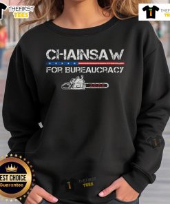 Alt Text: Top Chainsaw for Bureaucracy Doge sweatshirt showcasing humor in government efficiency and quirky design.