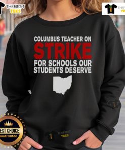 Columbus, Ohio school teachers on strike wearing 'Schools Our Students Deserve' sweatshirts, advocating for education reform.