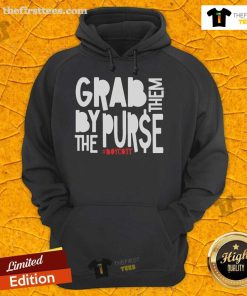 Protest hoodie reading 'Grab Them By The Purse' against oligarchy capitalism, showcasing activism and social justice themes.