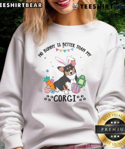 Tricolor Corgi dog in a festive sweatshirt for Easter Day, featuring 'No Bunny Is Better Than My Corgi' design.