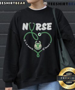 Cozy 'Top Nurse Milwaukee Bucks It's A Work Of Heart Sweatshirt' featuring team colors and heartwarming design.