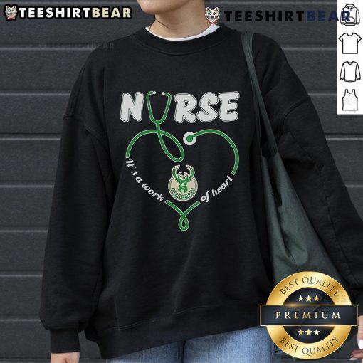 Cozy 'Top Nurse Milwaukee Bucks It's A Work Of Heart Sweatshirt' featuring team colors and heartwarming design.