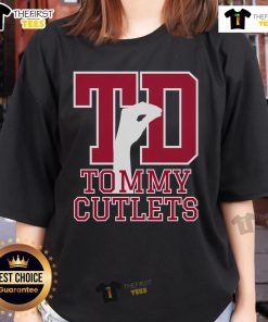 Top NY Italian hand gesture on Tommy Cutlets football ladies tee, showcasing New York pride and culture in stylish apparel.