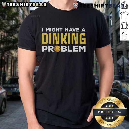 Alt Text: Top Pickleball I Might Have A Dinking Problem t-shirt worn by a player, showcasing a fun pickleball theme.