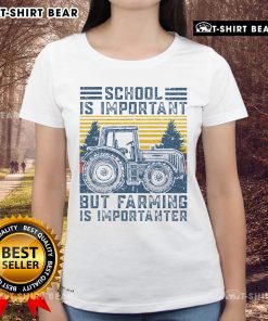 Top school is important but farming is importanter - farmer in a tractor wearing a ladies tee on a vibrant farm.