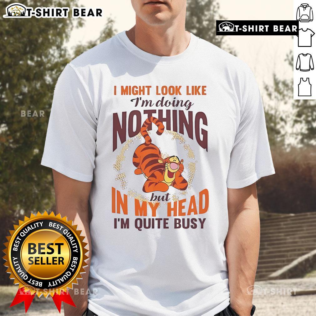 Top Tigger I Might Look Like I'm Doing Nothing But In My Head I'm Quite Busy T-Shirt Alt Text: Top Tigger I Might Look Like I'm Doing Nothing But In My Head I'm Quite Busy T-Shirt design featuring playful graphics.
