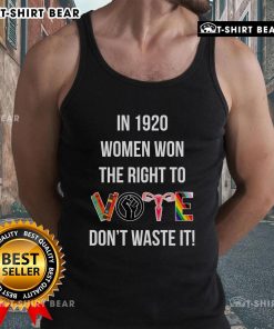 Empowered woman wearing 'Top Women Won The Right To Vote In 1920 Don't Waste It' tank top, celebrating women's suffrage.