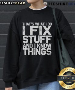 Cozy 'That's What I Do I Fix Stuff And I Know Things' sweatshirt featuring bold lettering, perfect for casual wear.
