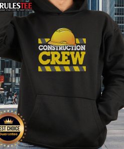 Awesome construction crew wearing construction hats and hoodies at a job site, showcasing teamwork and safety.