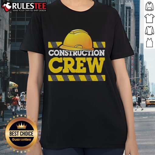 Awesome construction crew wearing construction hats and ladies' tees, showcasing teamwork and dedication on site.