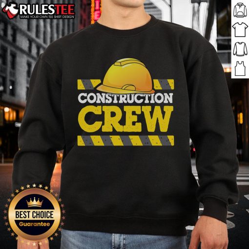 Awesome construction crew wearing hard hats and sweatshirts on a job site, showcasing teamwork and safety.
