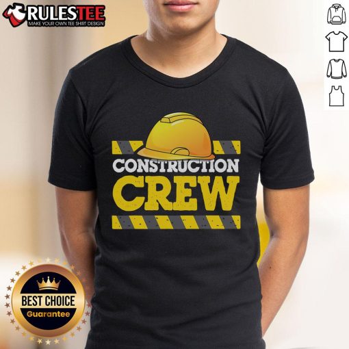 Awesome construction crew wearing construction hats and worker t-shirts on a job site, showcasing teamwork and safety.