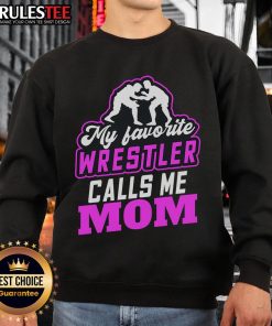 Awesome sweatshirt with 'My Favorite Wrestler Calls Me Mom' design, perfect for fans and mothers who love wrestling.