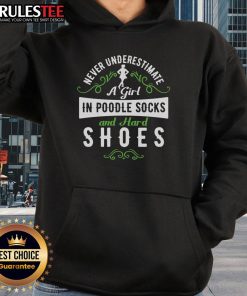 Girl in poodle socks and hard shoes wearing an 'Awesome Never Underestimate' hoodie, showcasing a playful style.