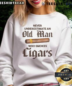 Awesome sweatshirt featuring an old man smoking a cigar with the phrase 'Never Underestimate' for a bold statement.