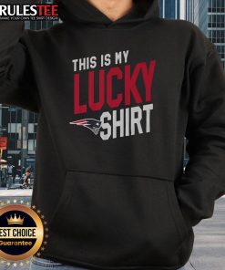 Alt Text: Man wearing an Awesome New England Patriots hoodie, showcasing team spirit and luck during a game day.