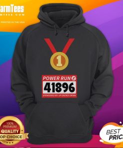 Runner in a hoodie at the Awesome Power Run half marathon, sponsored by Up Energy Drink, showcasing athletic energy.