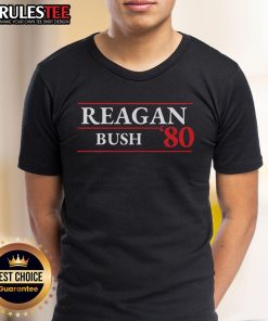 Awesome Reagan Bush 1980 Presidential Election T-Shirt featuring retro graphics and patriotic colors, perfect for collectors.