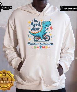Cute autism awareness dinosaur wearing a hoodie for April, promoting understanding and acceptance of autism.