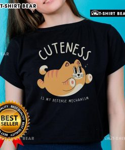 Cute cat graphic on 'Cuteness Is My Defense Mechanism' ladies tee, perfect for cat lovers and stylish casual wear.