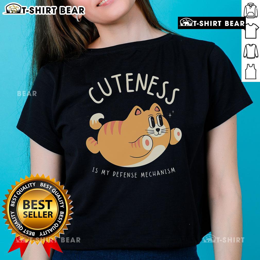 Cute Cat Cuteness Is My Defense Mechanism Ladies Tee Cute cat graphic on 'Cuteness Is My Defense Mechanism' ladies tee, perfect for cat lovers and stylish casual wear.