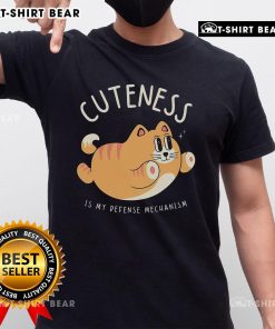 Alt Text: Cute Cat Cuteness Is My Defense Mechanism T-Shirt featuring an adorable cat graphic in vibrant colors.