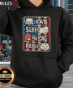 Alt Text: Adorable cat wearing a 'Eat Sleep Ping Pong Repeat' patriotic hoodie, embodying fun and playful table tennis spirit.