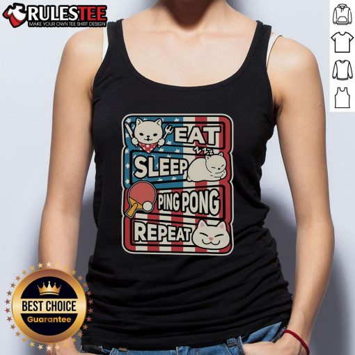 Alt Text: Cute cat wearing a patriotic table tennis tank top, embodying the eat, sleep, ping pong, repeat lifestyle.