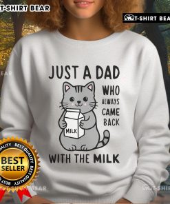 Cute cat wearing a 'Just a Dad Who Always Came Back with the Milk' sweatshirt, showcasing playful pet fashion.