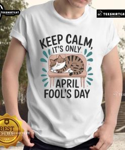 Alt Text: Cute cat graphic on a t-shirt with Keep Calm It's Only April Fools for Cat Fools Day pranks.