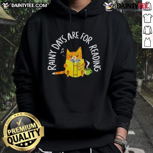 Cute cat wearing a hoodie that says 'Rainy Days Are For Reading,' perfect for cozy indoor moments.