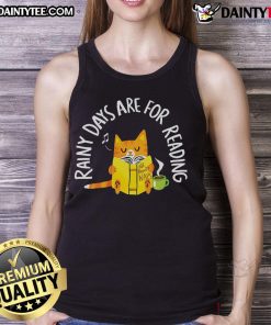 Cute cat in cozy tank top, perfect for rainy days and reading, showcasing comfort and style for pet lovers.