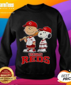 Alt Text: Cute Cincinnati Reds Charlie Brown and Snoopy baseball cartoon fan sweatshirt for stylish baseball enthusiasts.