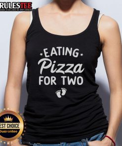 Adorable couple enjoying pizza while wearing a funny pregnancy announcement tank top for two.