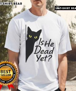 Alt Text: Cute black cat graphic on 'Is He Dead Yet' dark humor t-shirt, perfect for cat lovers and fans of quirky designs.