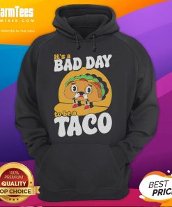 Alt Text: Cute 'It's A Bad Day To Be A Taco' hoodie featuring a fun taco graphic, perfect for casual wear and taco lovers.