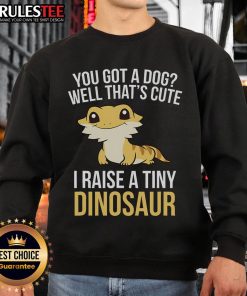 Cute lizard and gecko on a sweatshirt featuring I Raise a Tiny Dinosaur design, perfect for Bearded Dragon pet lovers.