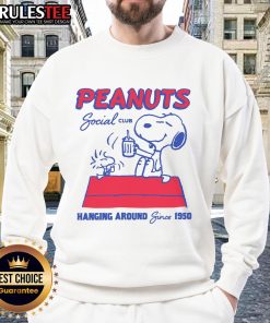 Alt Text: Cute Peanuts Social Club sweatshirt featuring classic cartoon characters, perfect for fans since 1950.