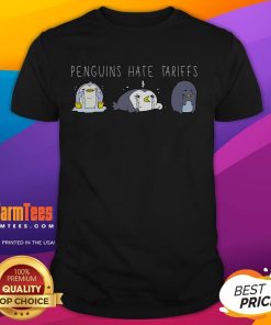 Alt Text: Cute penguins graphic on a 'Make Fish Cheap Again' T-Shirt, highlighting the message against tariffs.