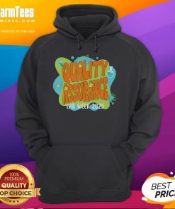 Cute quality assurance lab scientist wearing a retro Lab Week 2025 hoodie in a vibrant laboratory setting.