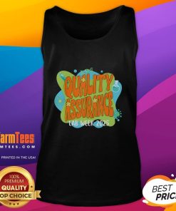 Cute quality assurance lab scientist wearing a retro tank top for Lab Week 2025, smiling in the lab.