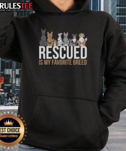 Alt Text: Cute rescued dog wearing a hoodie with 'Rescued is my favorite breed' slogan, showcasing love for animal adoption.