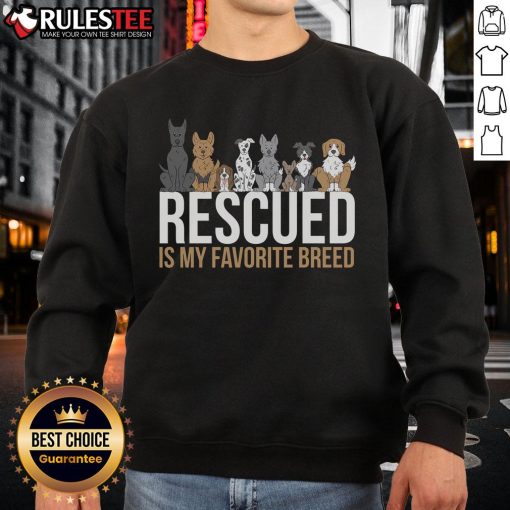 Cute rescued dog wearing a 'My Favorite Breed' sweatshirt, showcasing love for animals and rescue pets.