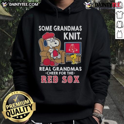 Cute Snoopy in a Peanuts hoodie, cheering for the Boston Red Sox, showcasing grandmas' knitting love.
