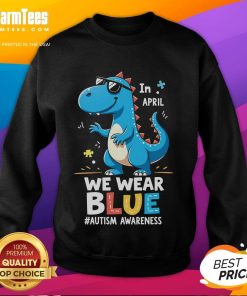 Cute T-Rex dinosaur with sunglasses on an autism awareness sweatshirt, promoting acceptance and fun.