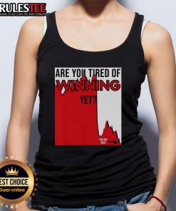 Funny tank top design reading 'Are You Tired of Winning Yet?' with market disaster and politics theme. Perfect for humor lovers.