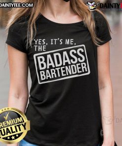 Funny badass bartender in a pub, showcasing humor and style in a trendy ladies tee for bar owners and bartenders.