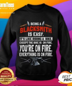 Alt Text: Humorous sweatshirt design saying Being a Blacksmith is Easy with fire graphics, perfect for blacksmith enthusiasts.