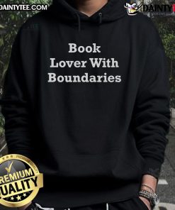 Funny book lover wearing a Boundaries hoodie, showcasing a humorous take on reading and personal space.